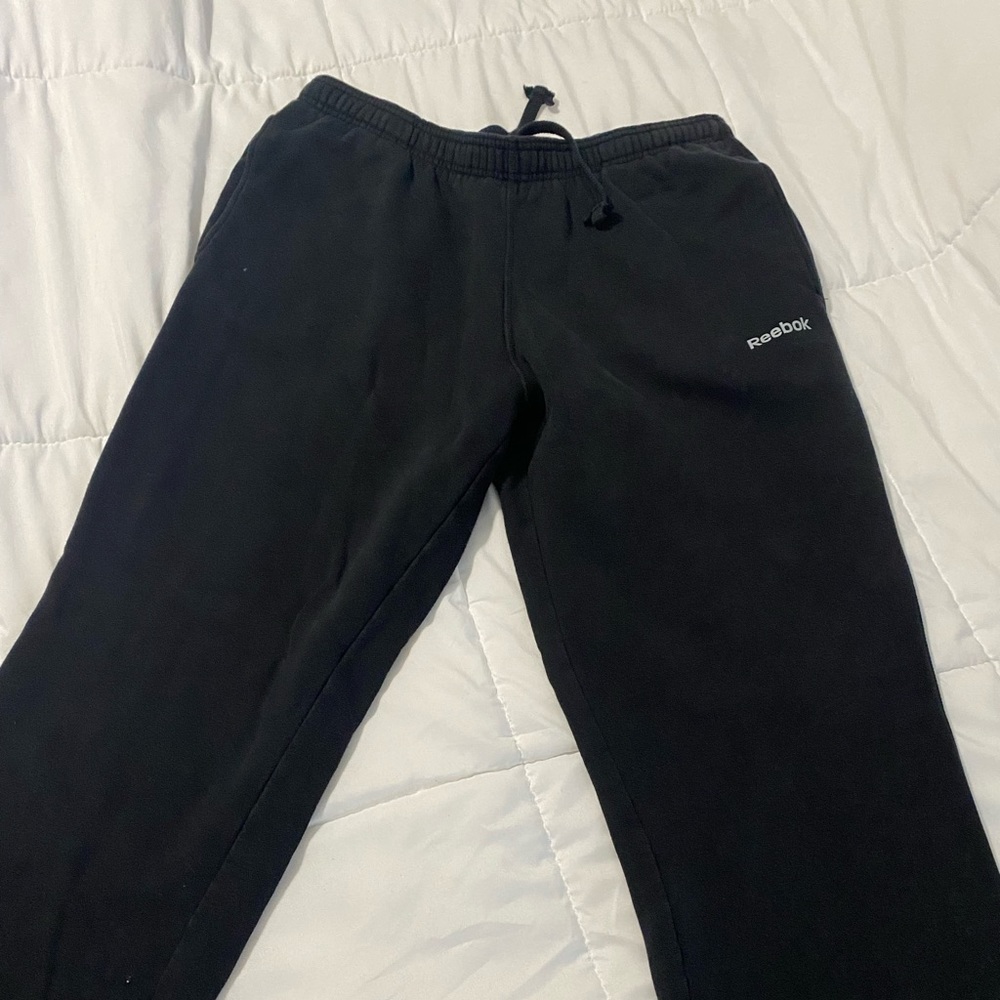 Reebok sweatpants with no rips or tears. Great condition.